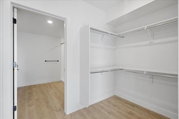 Large empty closet with shelves1